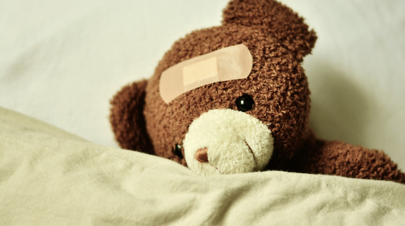 Pflaster an einem Teddybären